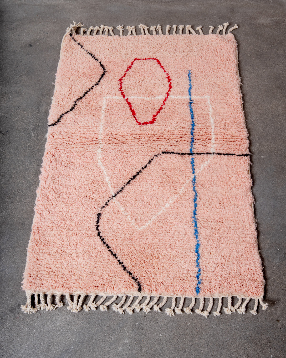 Modern, designer, handcrafted Berber rug from Morocco. Beniourain carpet with beautiful colours and patterns and fluffy wool texture.